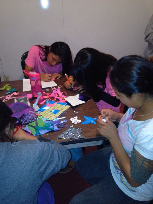 Girls making gifts for Ani's mother