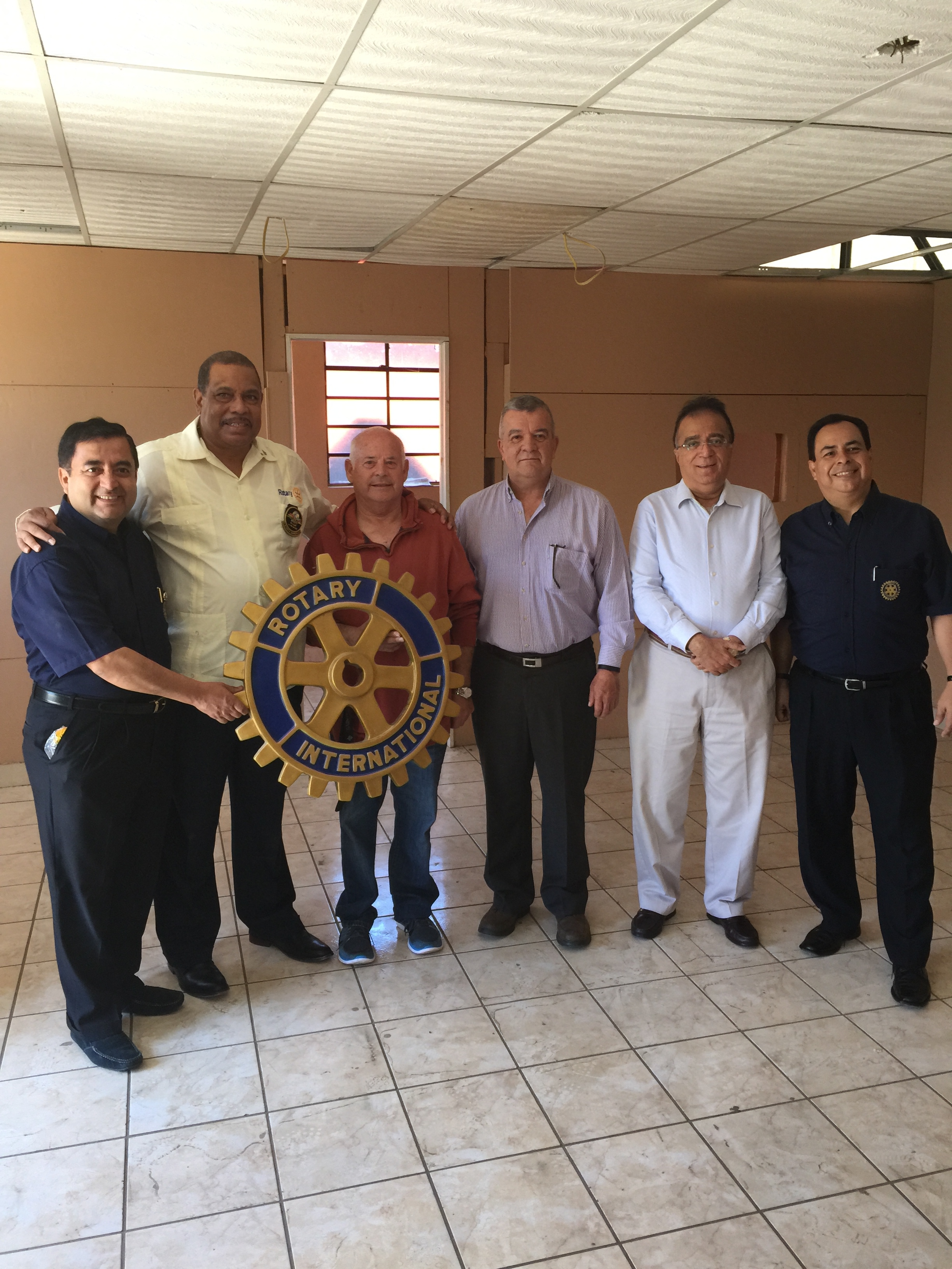 International Rotarians. The Governor is the large man