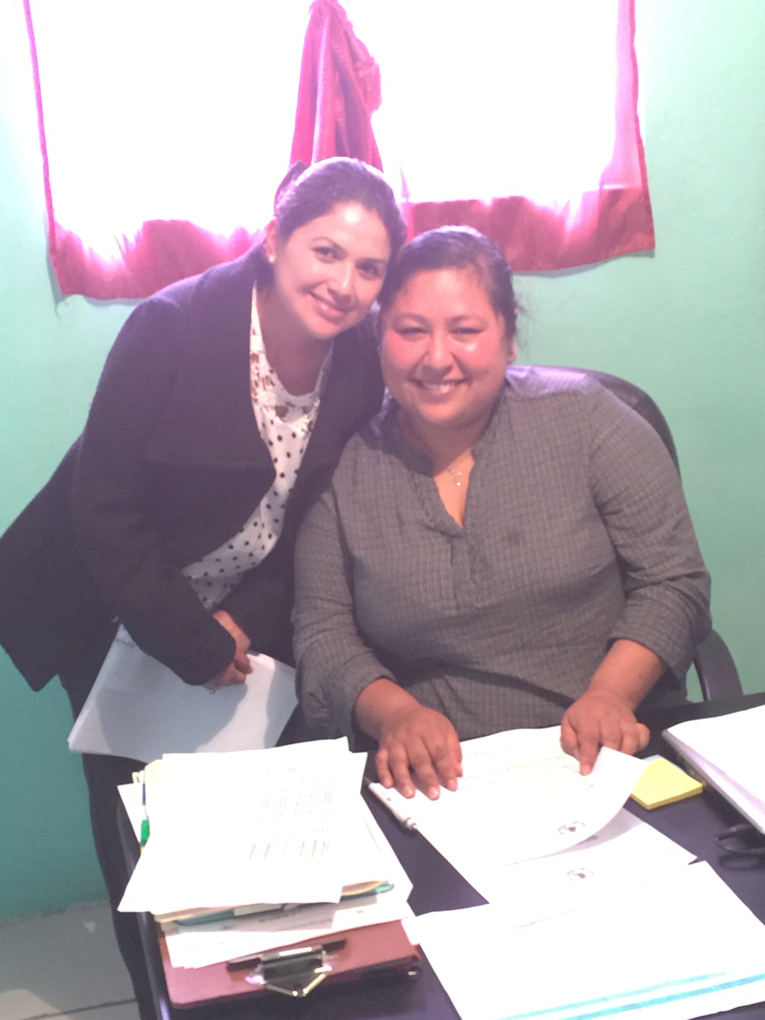 Lily and Analy doing paperwork