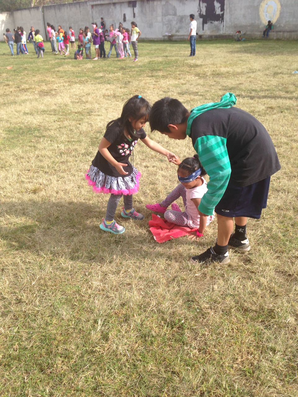 The little ones playing a game at with the discipleship team.
