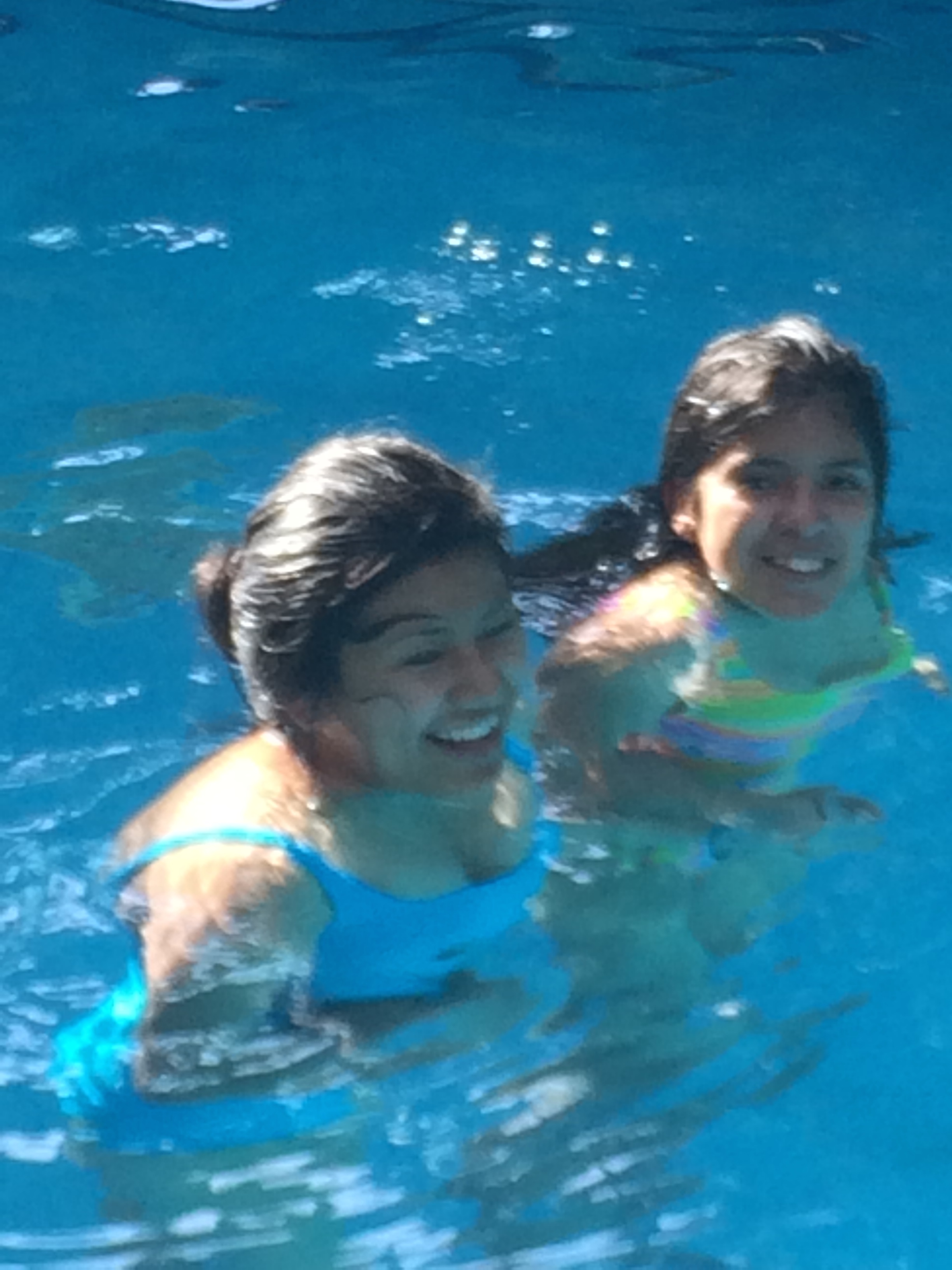 The girls love the pool at the hotel
